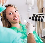 Smiling woman in dental chair