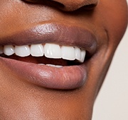 Nose-to-chin closeup of a beautiful, flawless smile