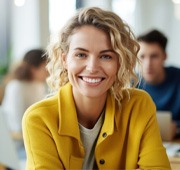 young woman smiling in coffee shop 