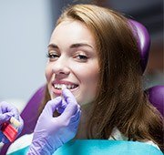 Woman receiving metal free dental restoration