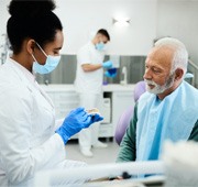 Man discussing dentures in Salem 