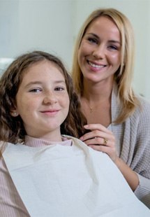 a mother and daughter getting dental care near South Central