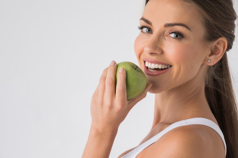 woman eating an apple 